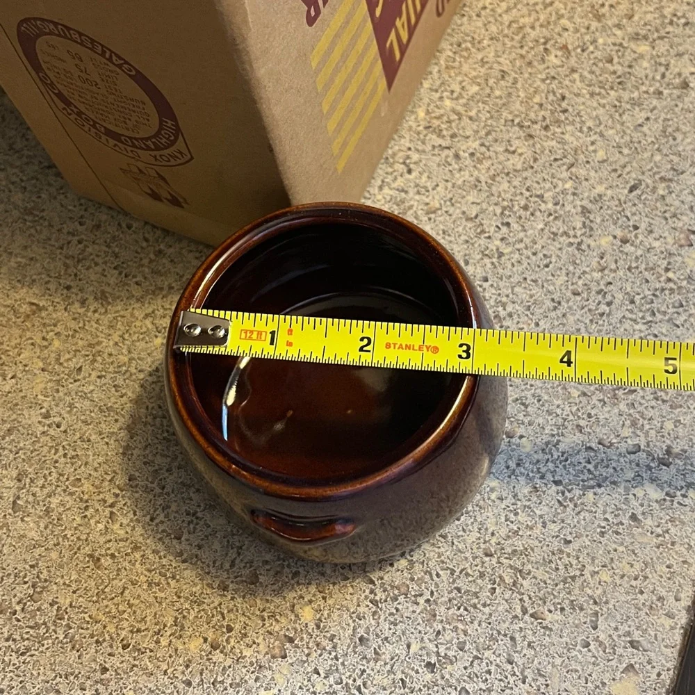 Vintage set of four West Bend bean pots. No. 5.109 with original box.
